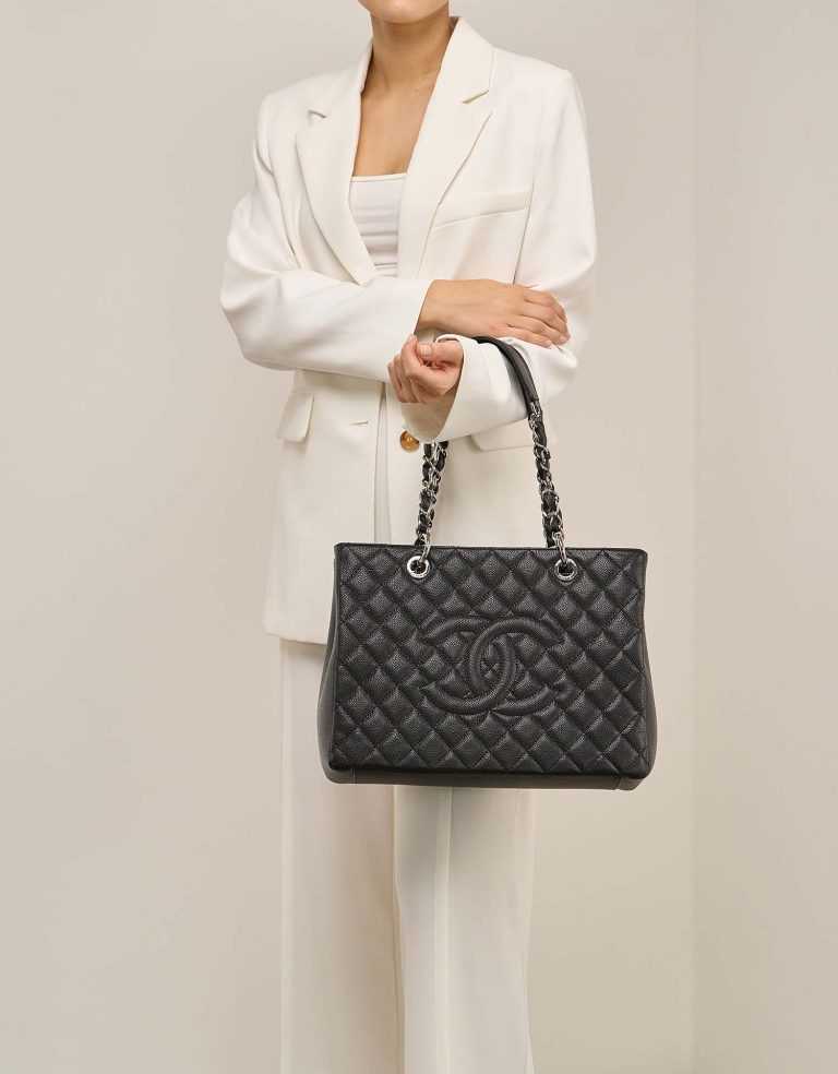 Chanel Shopping Tote GST Caviar Black on Model | Sell your designer bag