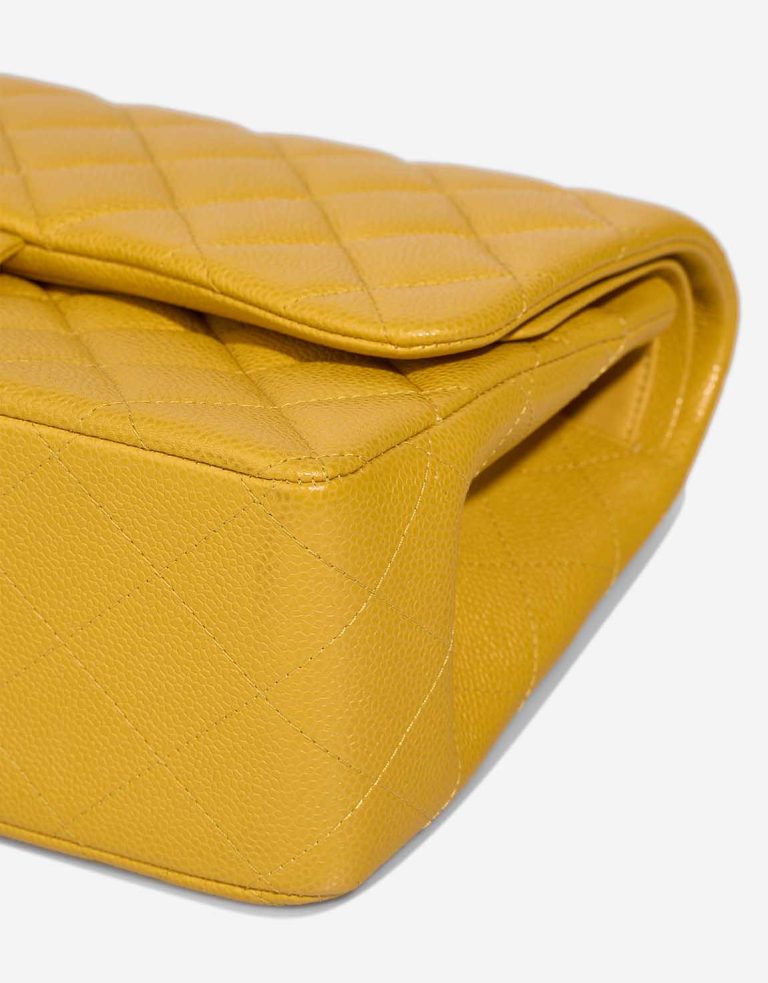 Chanel Timeless Jumbo Caviar Amber Signs of wear | Sell your designer bag