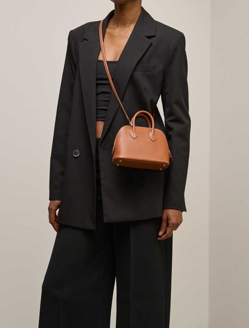 Hermès Bolide 1923 Mini Evercolor Gold on Model | Sell your designer bag