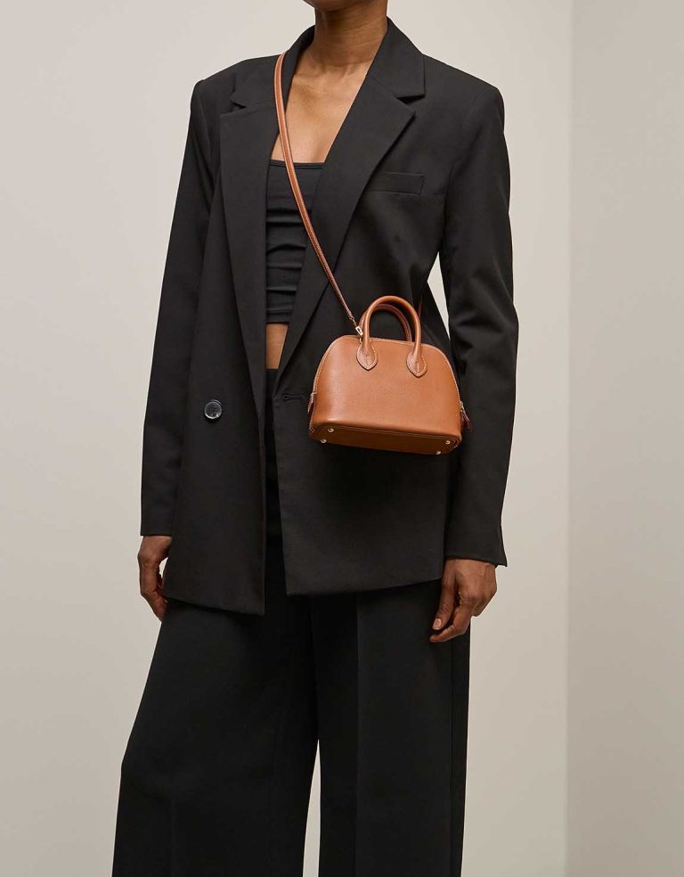 Hermès Bolide 1923 Mini Evercolor Gold on Model | Sell your designer bag