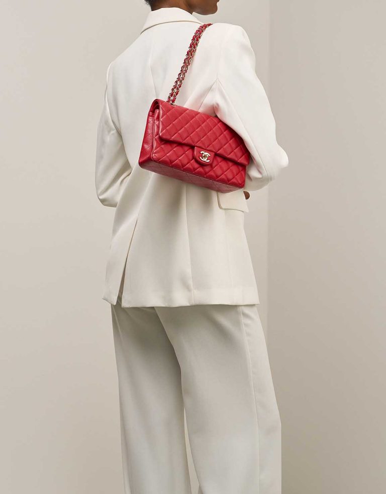 Chanel Timeless Medium Caviar Red on Model | Sell your designer bag