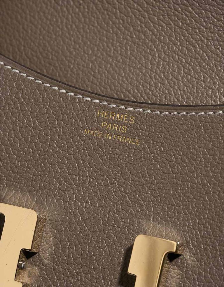 Hermès Constance Slim Wallet Evercolor Étoupe Logo | Sell your designer bag