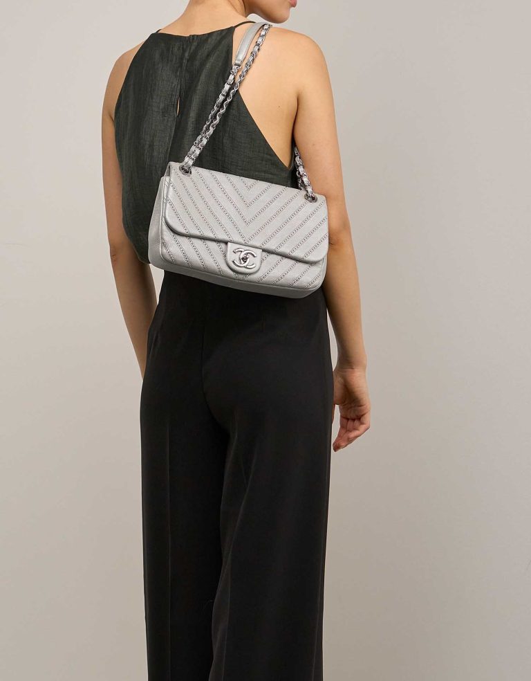 Chanel Timeless Medium Calf / Studs Silver on Model | Sell your designer bag