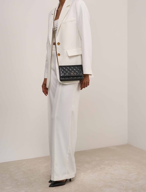 Chanel Wallet On Chain Timeless Caviar Black on Model | Sell your designer bag