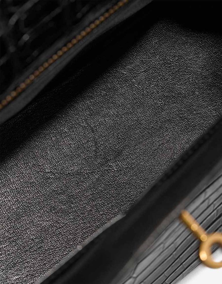 Hermès Kelly 28 Porosus Crocodile Black Signs of wear | Sell your designer bag