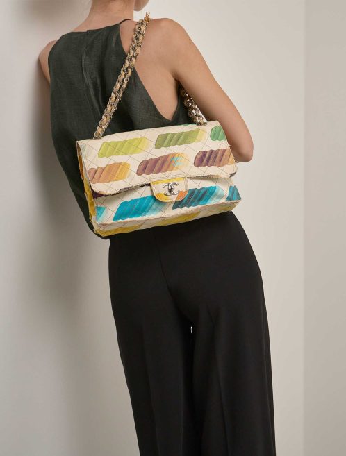 Chanel Timeless Flap Jumbo Canvas White Paint Palette on Model | Sell your designer bag