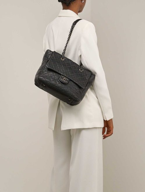 Chanel Grand Shopping Tote Goat Black on Model | Sell your designer bag