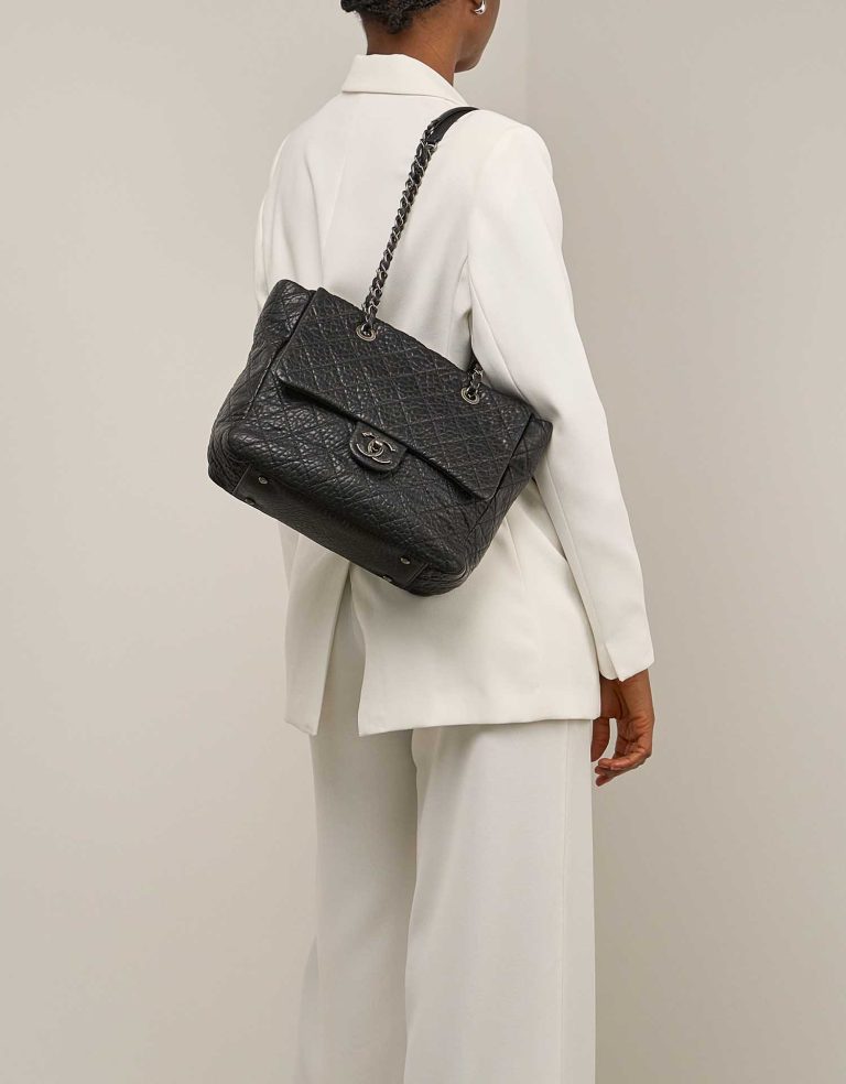 Chanel Grand Shopping Tote Goat Black on Model | Sell your designer bag