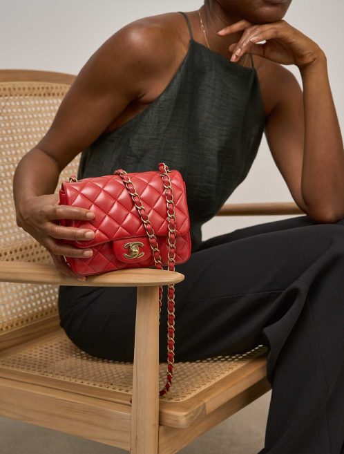 Chanel Timeless Mini Square Lamb Red on Model | Sell your designer bag