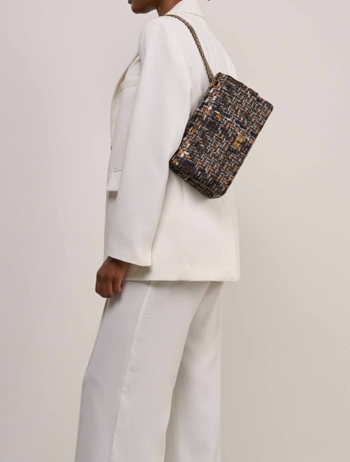 Chanel 2.55 Reissue 226 Tweed Brown on Model | Sell your designer bag