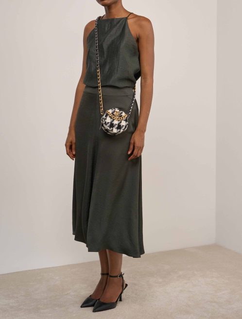 Chanel 19 Round Clutch Tweed Black / White on Model | Sell your designer bag