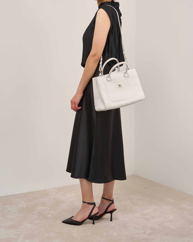 Chanel Neo Executive Medium Calf White on Model | Sell your designer bag
