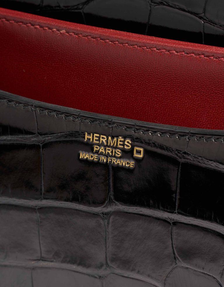 Hermès Constance 24 Alligator Mississippi Black / Rouge Grenat Logo | Sell your designer bag