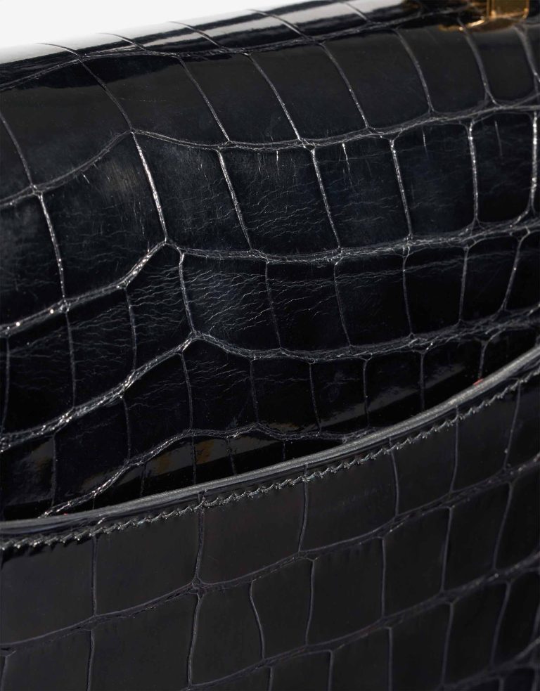 Hermès Constance 24 Alligator Mississippi Black / Rouge Grenat Signs of wear | Sell your designer bag