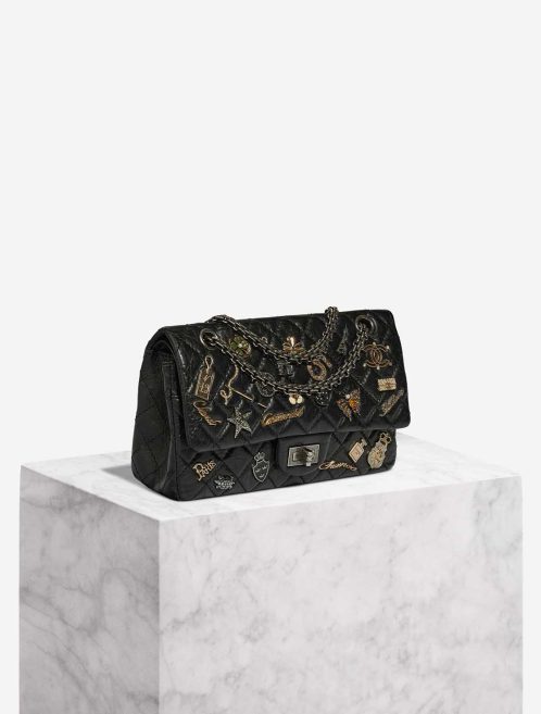Chanel 2.55 Reissue Lucky Charms 225 Aged Calf Black Front | Sell your designer bag