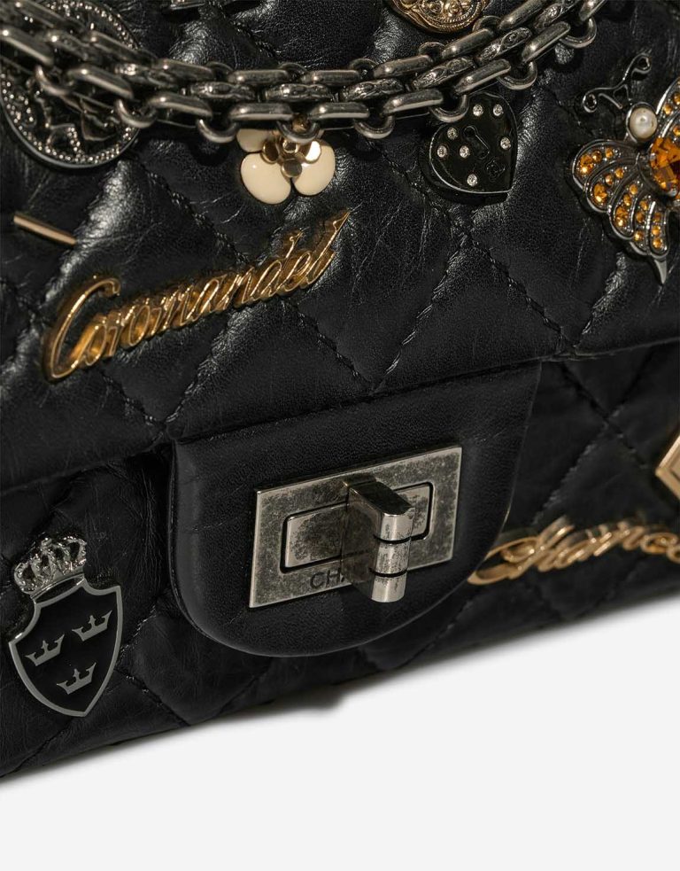 Chanel 2.55 Reissue Lucky Charms 225 Aged Calf Black Closing System | Sell your designer bag