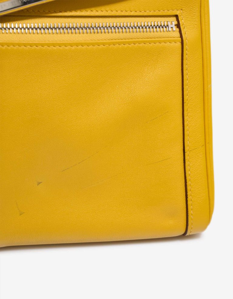 Hermès Kelly Lakis 32 Swift Jaune Ambre Signs of wear | Sell your designer bag