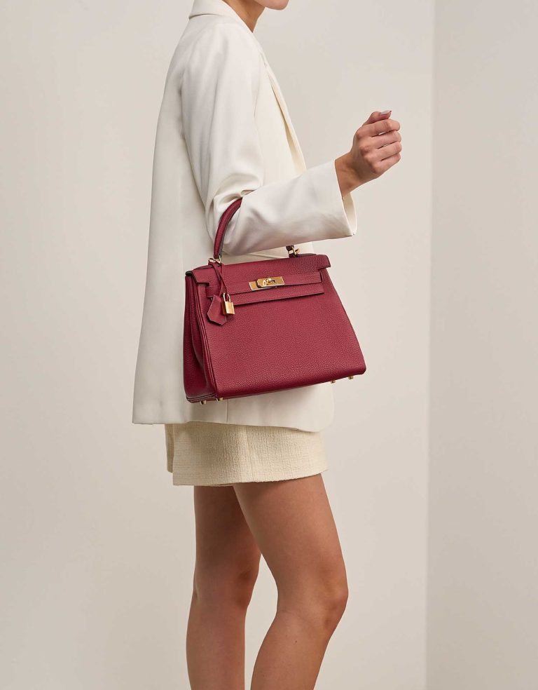 Hermès Kelly 28 Togo Rouge Grenat on Model | Sell your designer bag