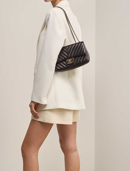 Chanel Timeless Small Lamb Black on Model | Sell your designer bag