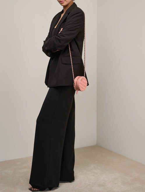 Chanel 19 Round Clutch Lamb Blush  on Model | Sell your designer bag