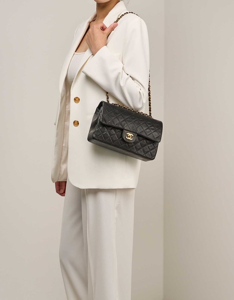 Chanel Timeless Medium Lamb Black on Model | Sell your designer bag