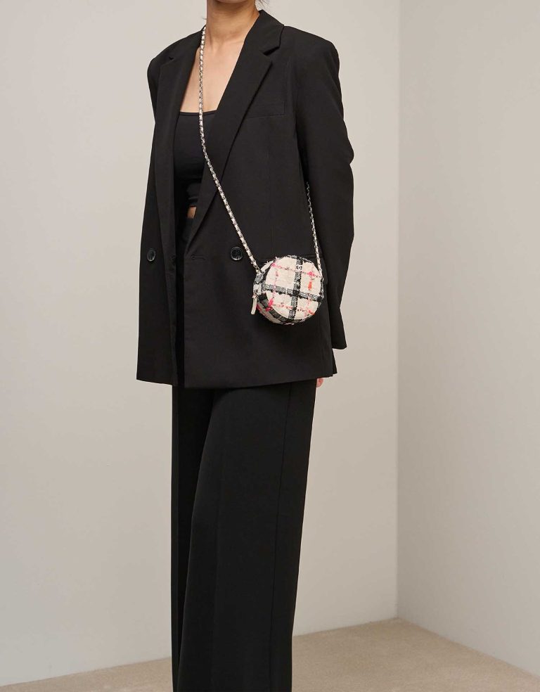 Chanel Round Clutch Medium Tweed White / Black on Model | Sell your designer bag