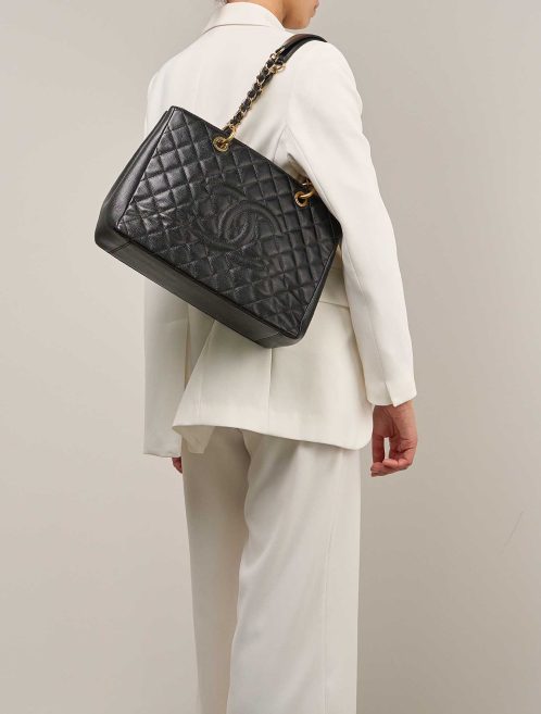 Chanel Shopping Tote GST Caviar Black on Model | Sell your designer bag