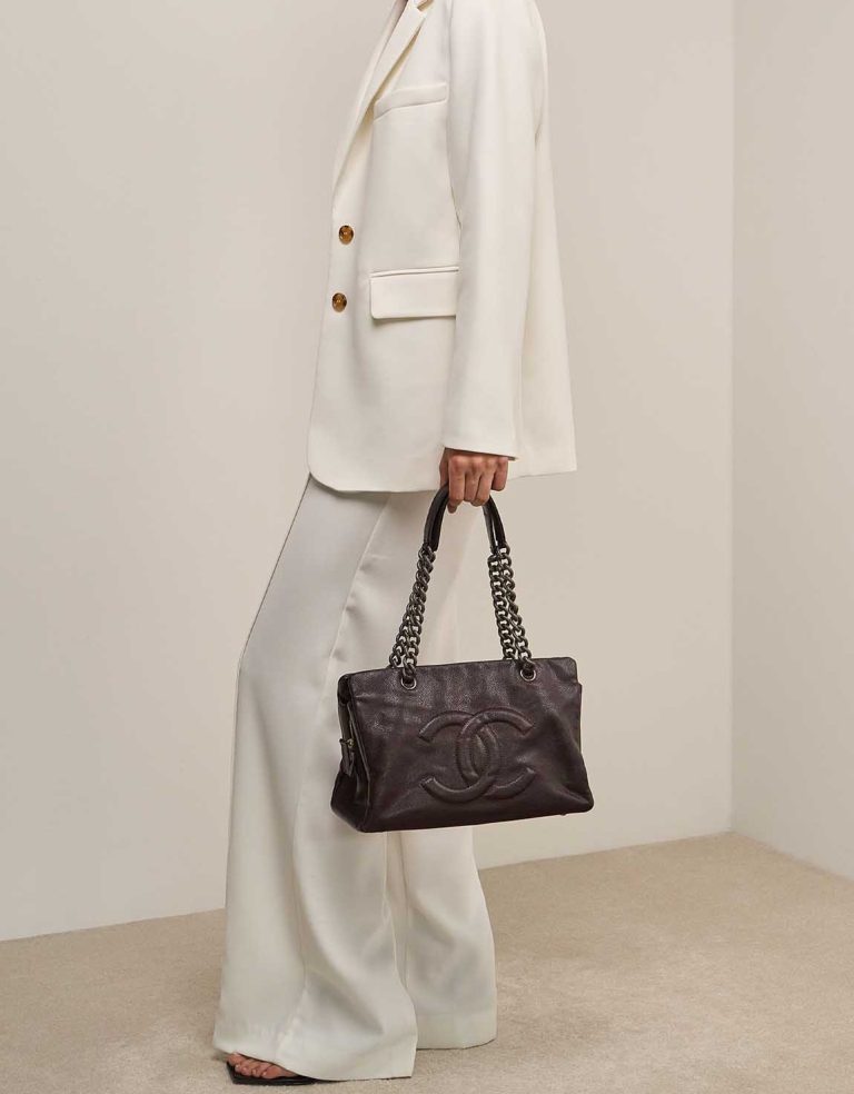 Chanel Shopping Tote PST Caviar Dark Brown on Model | Sell your designer bag