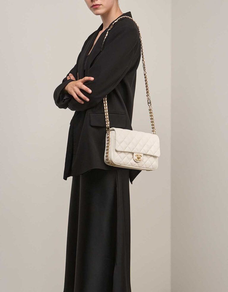 Chanel Timeless Medium Caviar White on Model | Sell your designer bag