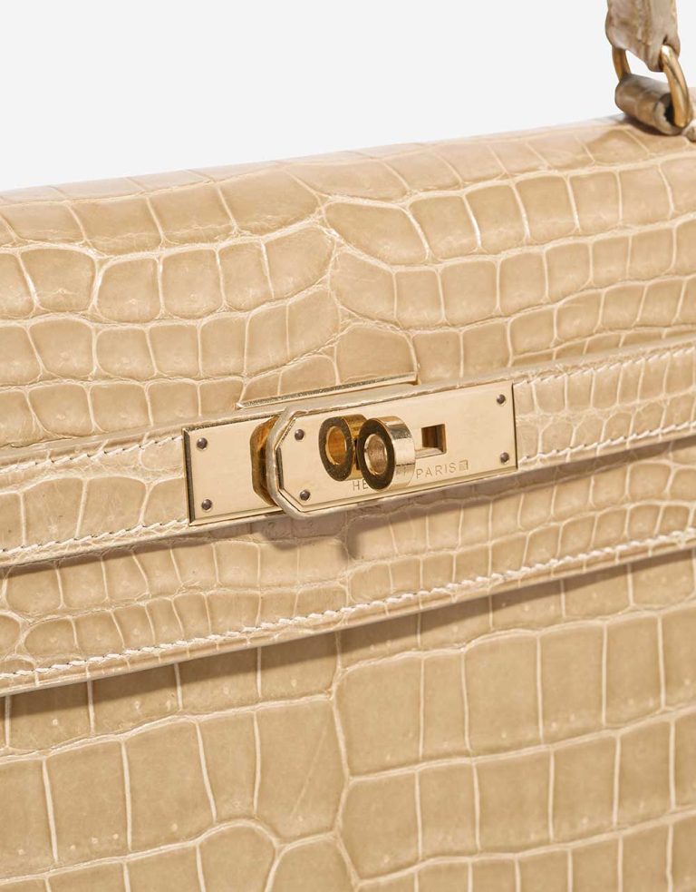 Hermès Kelly 32 Porosus Crocodile Poussière Closing System | Sell your designer bag