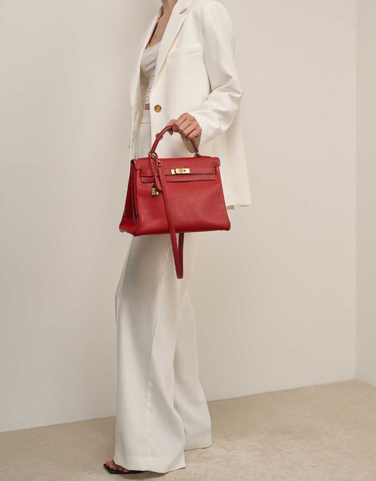Hermès Kelly 32 Ardennes Rouge Vif on Model | Sell your designer bag