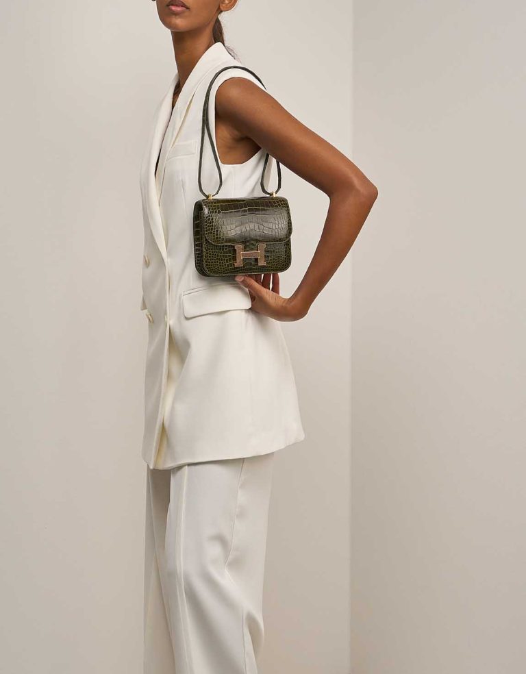 Hermès Constance 18 Alligator / Lizard Vert Véronèse on Model | Sell your designer bag