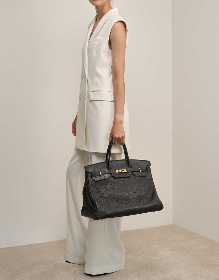 Hermès Birkin 40 Vache Fjord Black on Model | Sell your designer bag