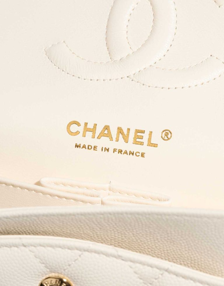 Chanel Timeless Medium Caviar White Logo | Sell your designer bag