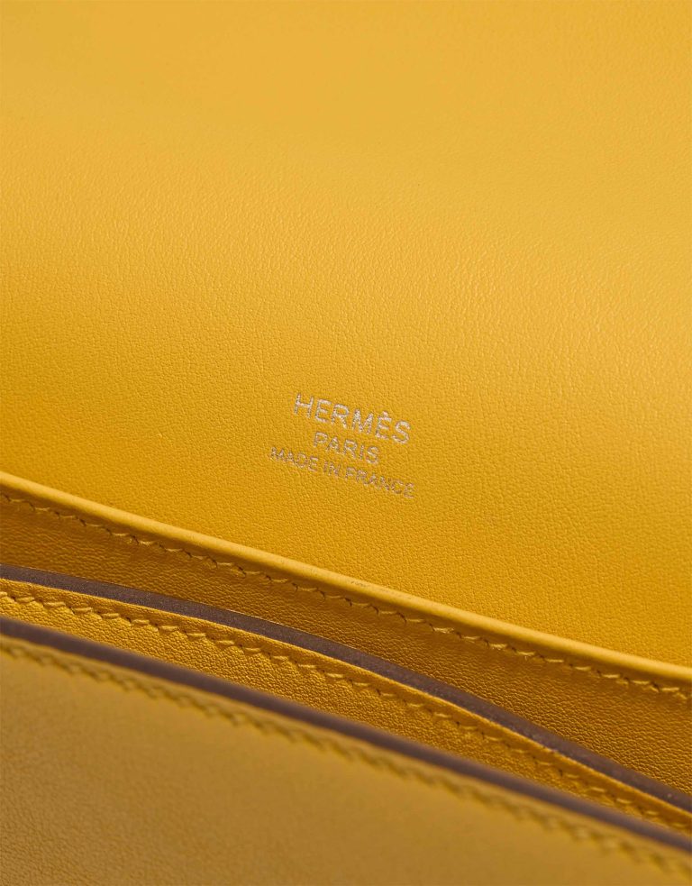 Hermès Roulis 18 Swift Jaune Ambre Logo | Sell your designer bag