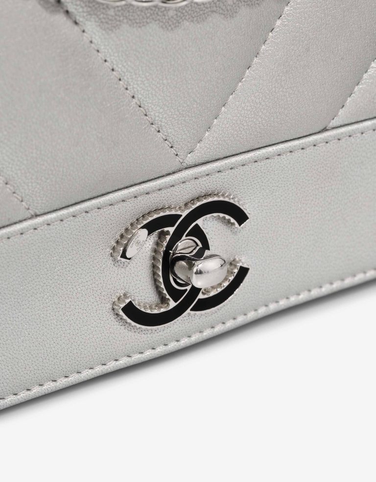 Chanel Mademoiselle Flap Bag Small Goatskin Chevron Silver Closing System | Sell your designer bag