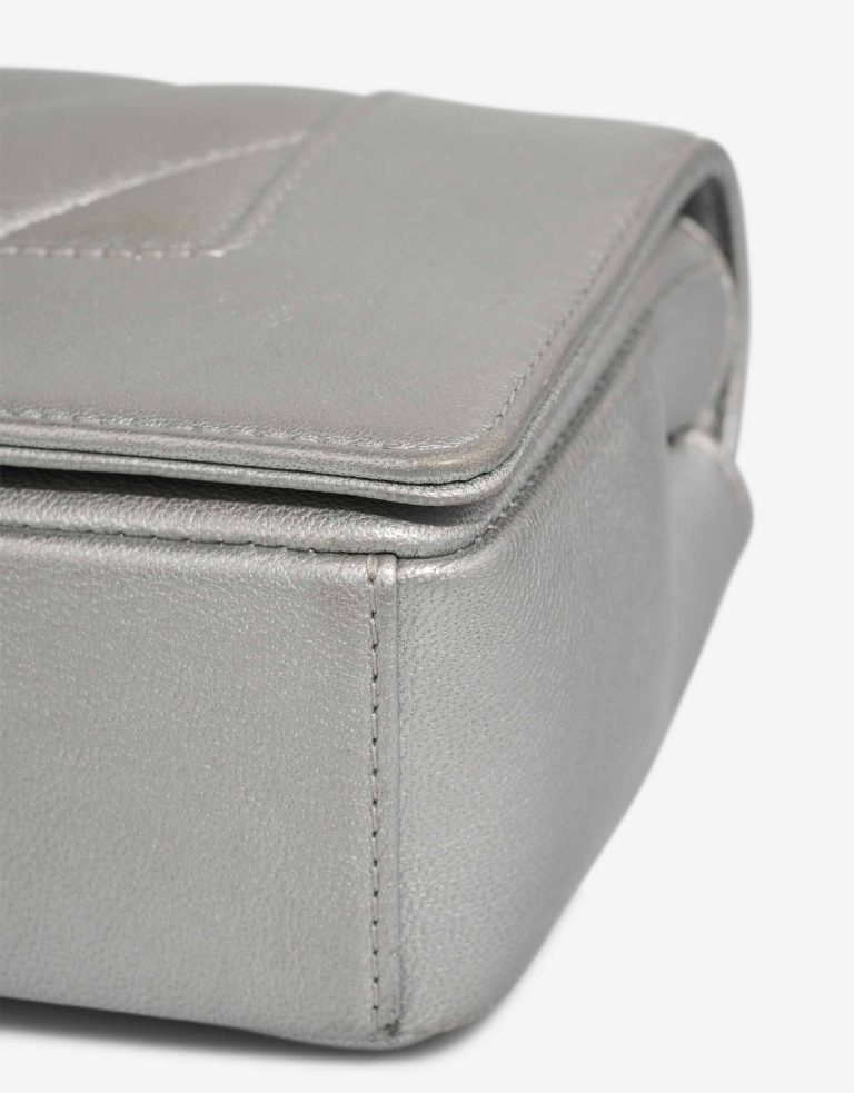 Chanel Mademoiselle Flap Bag Small Goatskin Chevron Silver Signs of wear | Sell your designer bag