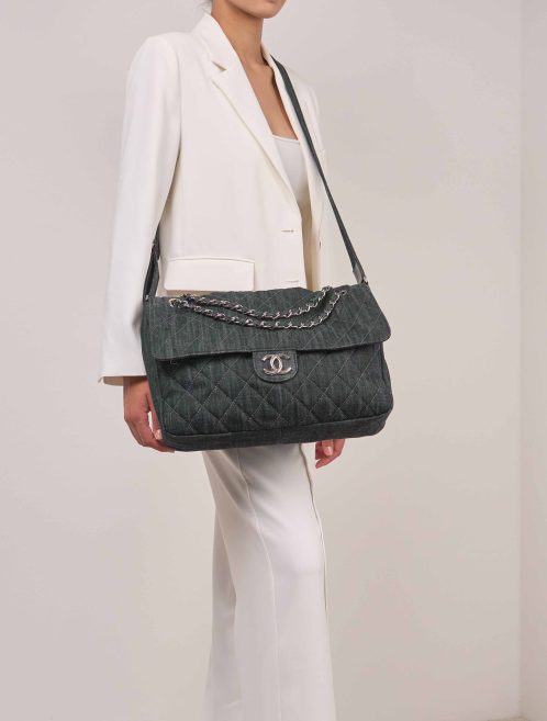 Chanel Timeless Maxi Denim Dark Blue on Model | Sell your designer bag