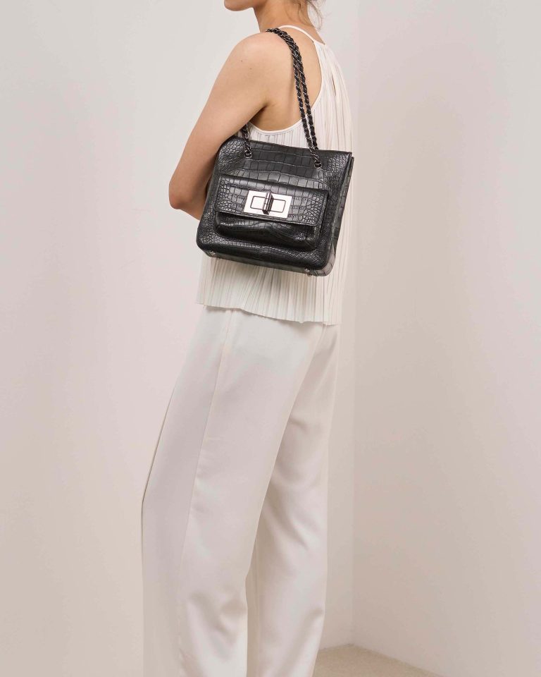 Chanel Shopping Tote Small Matte Alligator Black on Model | Sell your designer bag