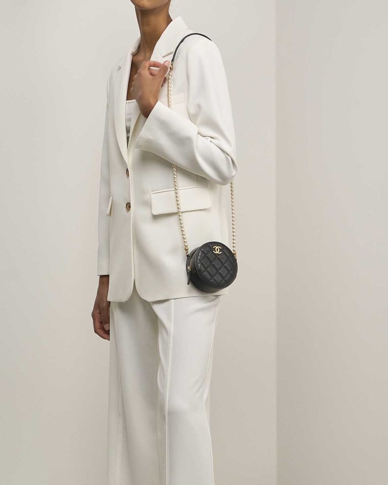 Chanel Round Clutch Calf Black on Model | Sell your designer bag