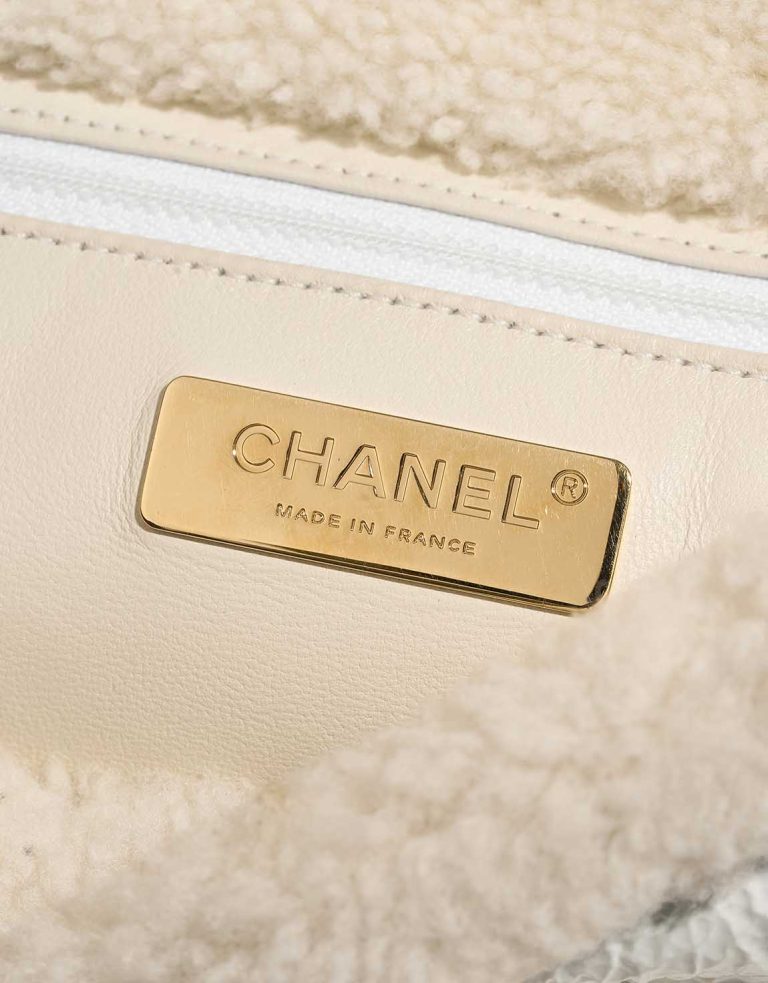 Chanel 19 Flap Bag Shearling White Logo | Sell your designer bag