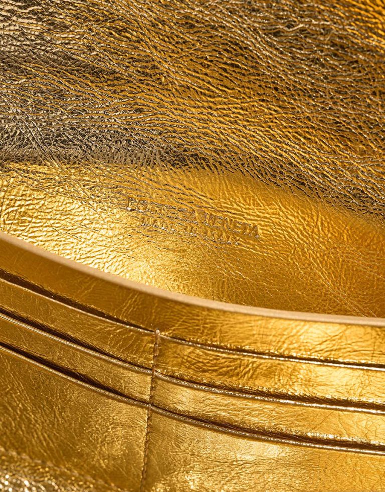 Bottega Veneta Andiamo Clutch Patent Metallic Gold Logo | Sell your designer bag