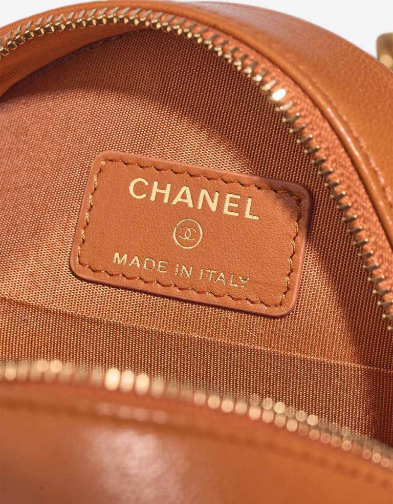 Chanel 19 Round Clutch Lamb Brown Logo | Sell your designer bag
