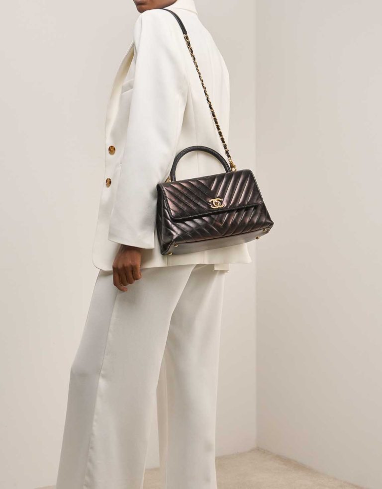 Chanel Timeless Handle Medium Lamb / Lizard Black on Model | Sell your designer bag
