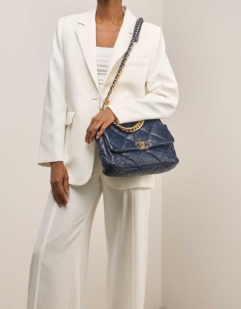 Chanel 19 Flap Bag Large Lamb Blue on Model | Sell your designer bag