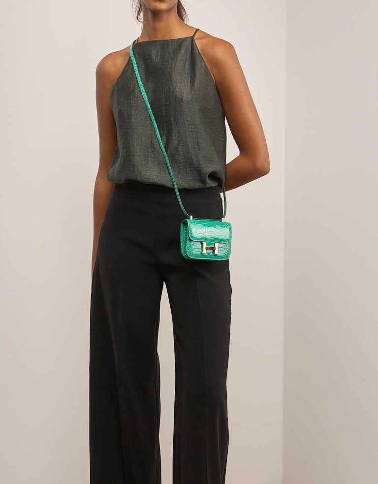 Hermès Constance Micro Alligator Mississippi Vert Jade on Model | Sell your designer bag
