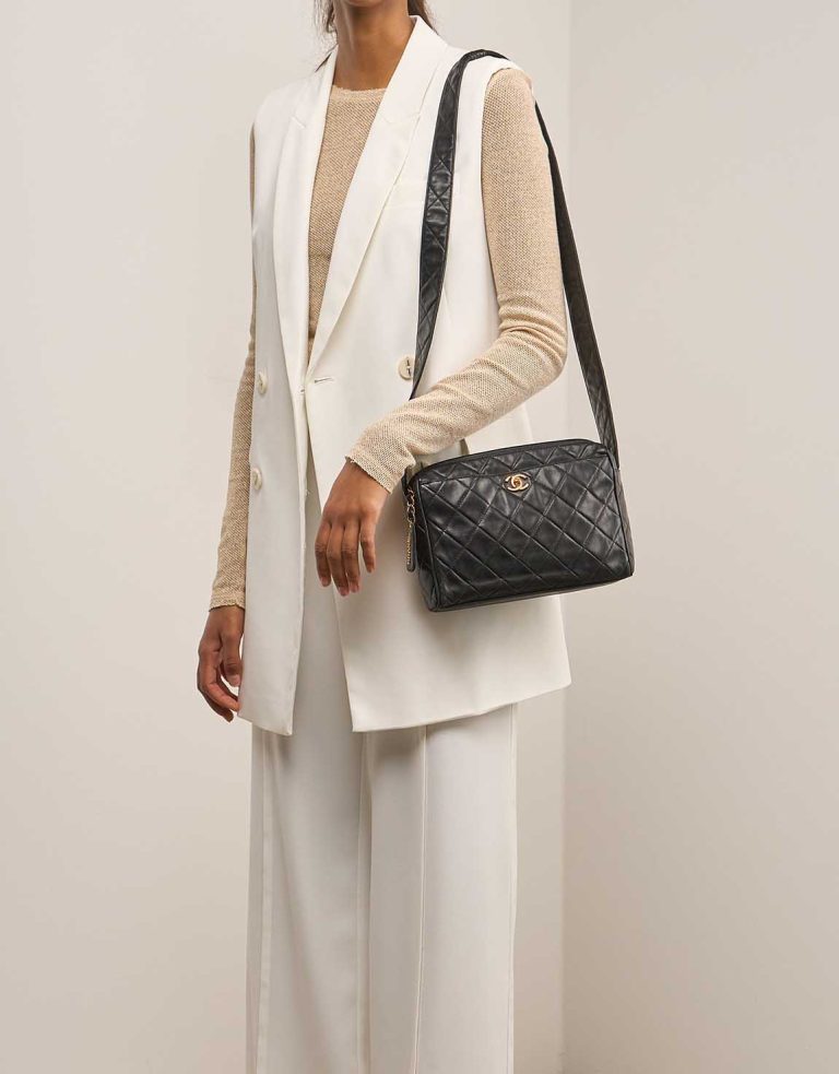 Chanel Camera Bag Lamb Black on Model | Sell your designer bag