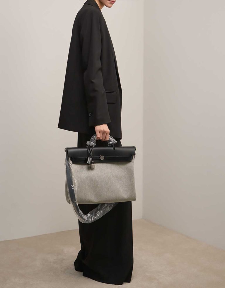 Hermès Herbag 39 Toile / Vache Hunter Black / Écru on Model | Sell your designer bag