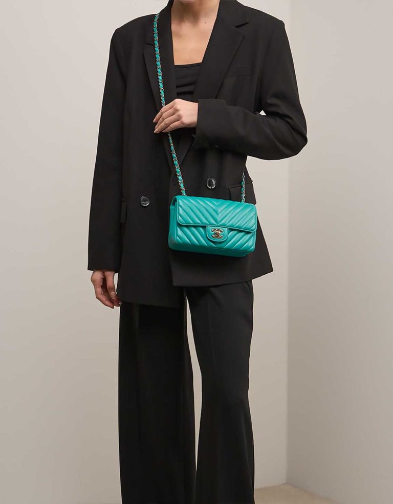 Chanel Timeless Mini Rectangular Lamb Turquoise on Model | Sell your designer bag