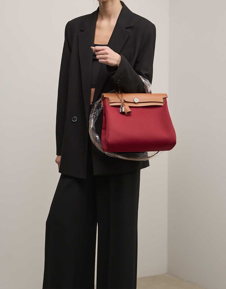 Hermès Herbag 31 Vache Hunter / Toile Militaire Naturel / Rouge Grenat on Model | Sell your designer bag